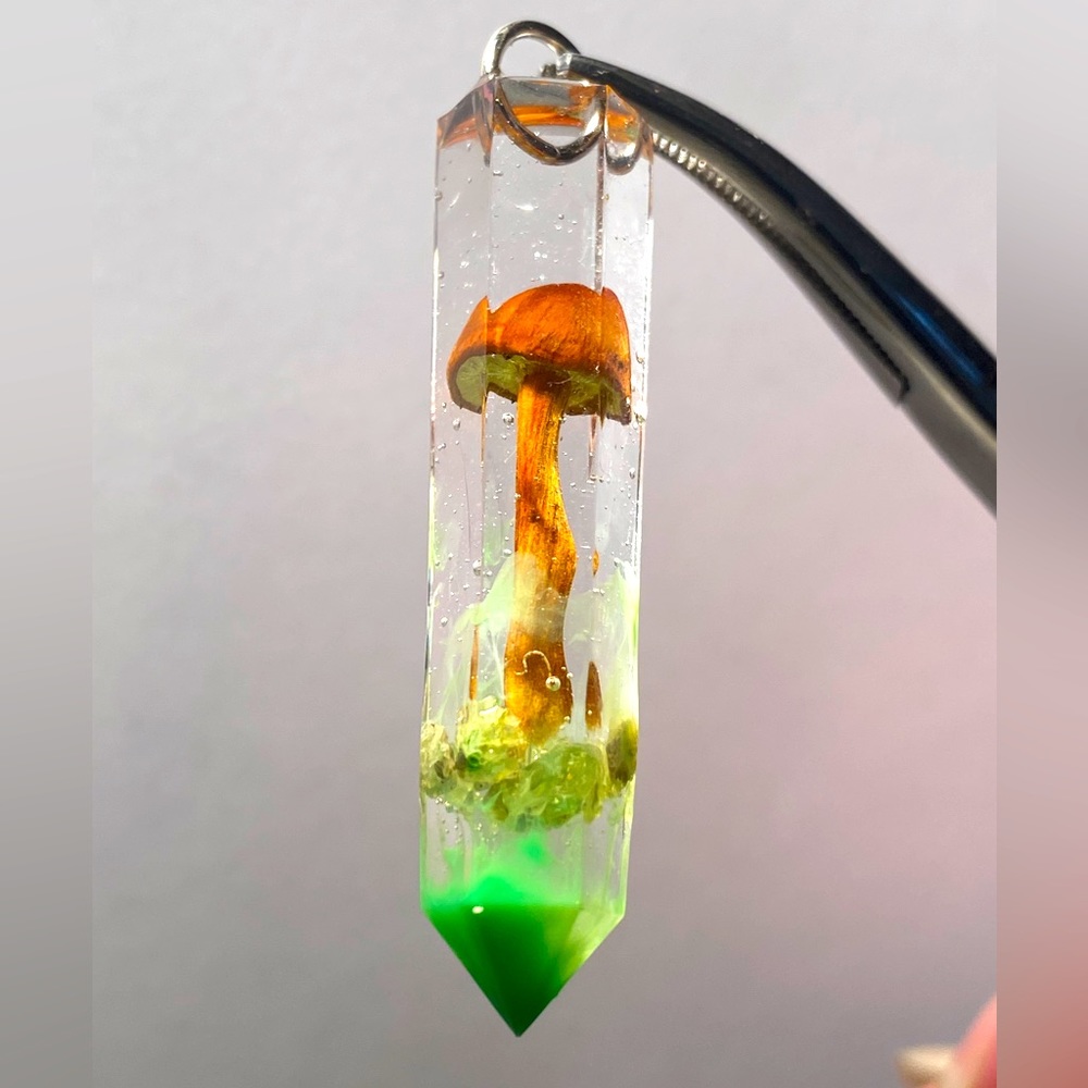 Golden mushroom with peridot and mica powder accents